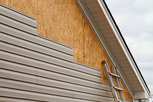 Professional Siding Contractor technician working in Mill Neck, NY